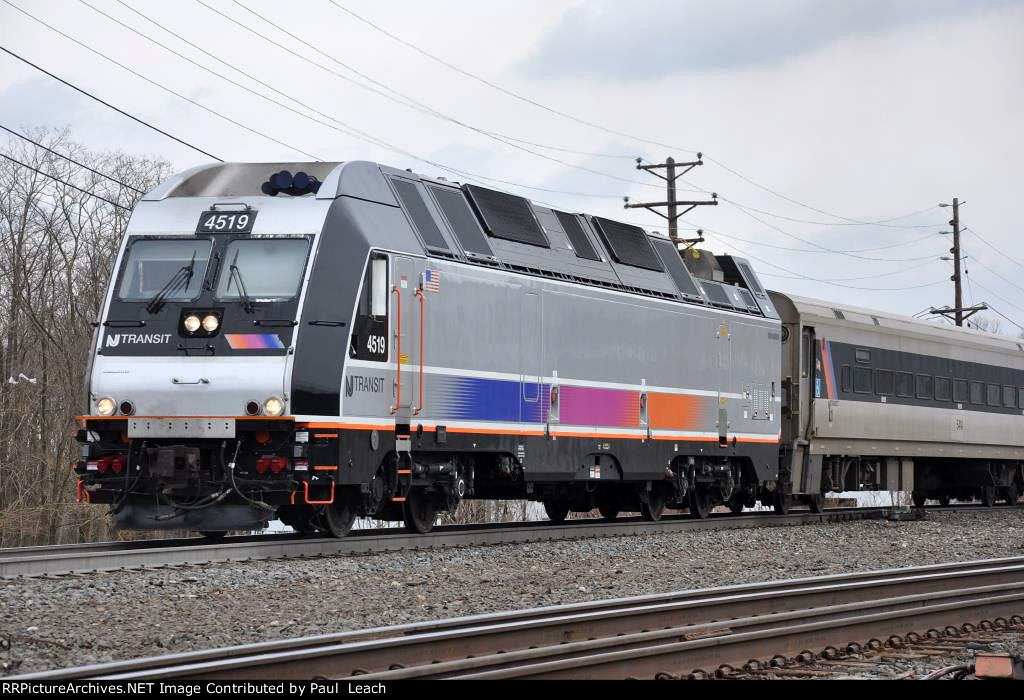 Outbound commuter cruises west out of the station